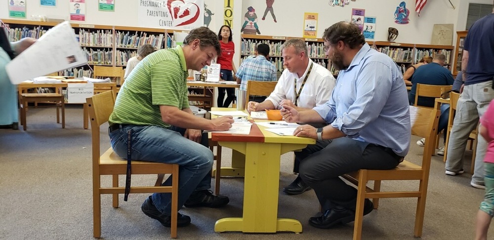 Even principals have to register for the new year.